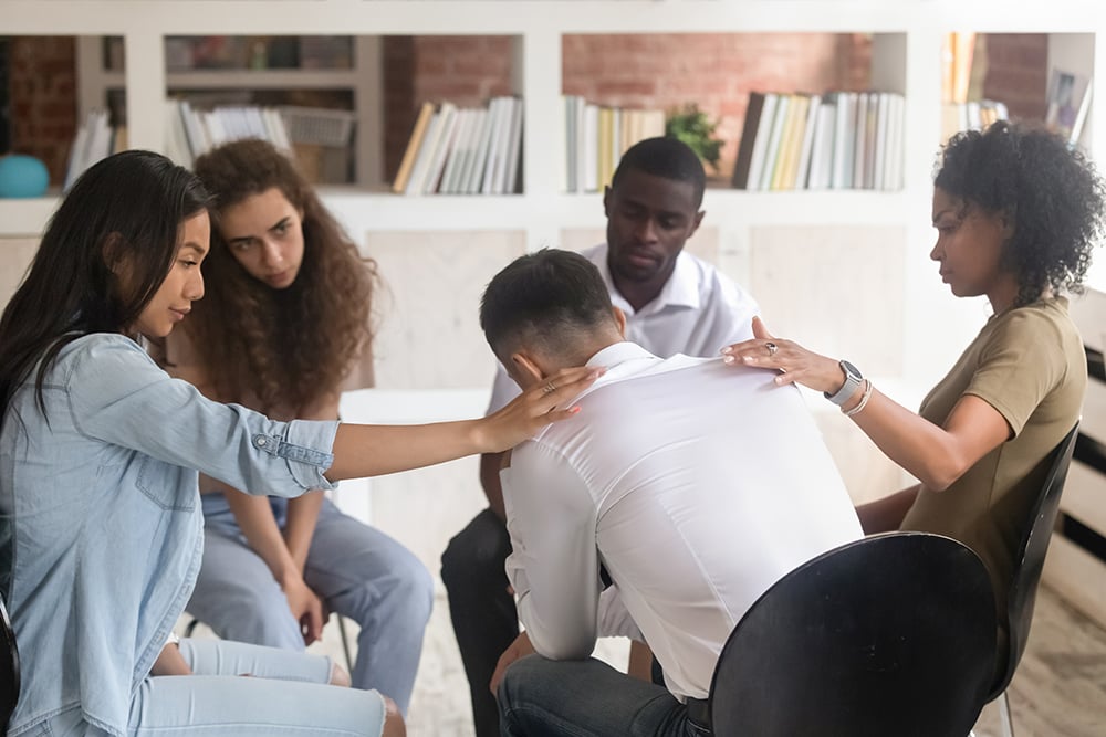 Back,view,of,diverse,people,sit,in,circle,at,psychological